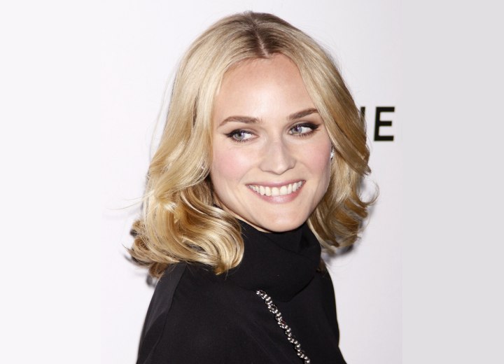 Diane Kruger - medium hairstyle with a middle part