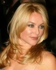 Elisabeth Rohm wearing her long hair in a simple evening look hairstyle