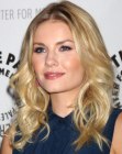 Elisha Cuthbert's sleek long hair with curled ends