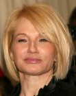 Ellen Barkin's on trend halfway the neck bob with long side bangs