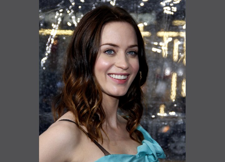 Emily Blunt wearing her hair with light curls
