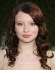 Emily Browning with her hair in an old-fashioned style with curls