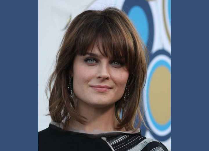 Emily Deschanel - Hairstyle with layers that covers the neck