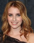 Emma Roberts wearing her hair long with spiral waves