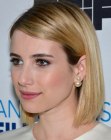 Emma Roberts sporting a sleek long bob with a side part