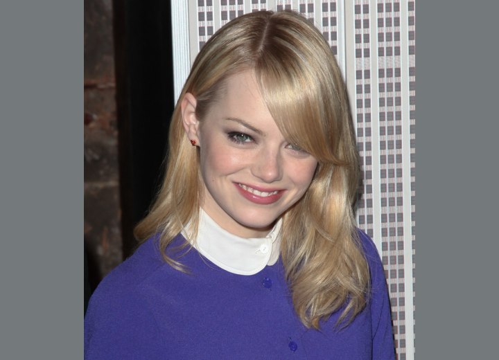 Emma Stone with long multi tonal blonde hair