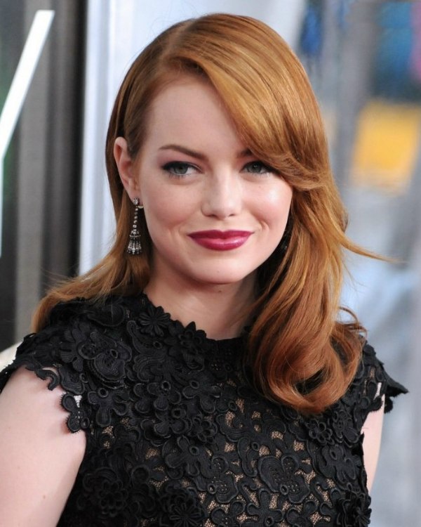 Emma Stone's long russet hair that matches her skin tone