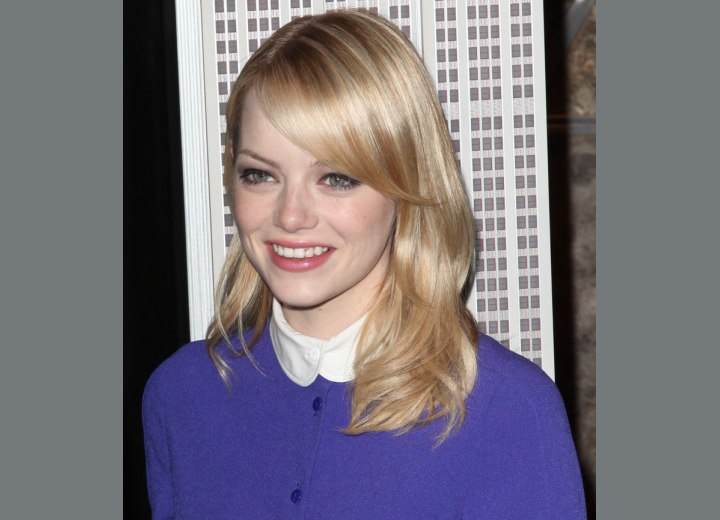 Emma Stone wearing a blouse with a rounded collar