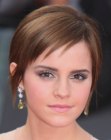 Emma Watson with short hair that was styled for a smooth appearance