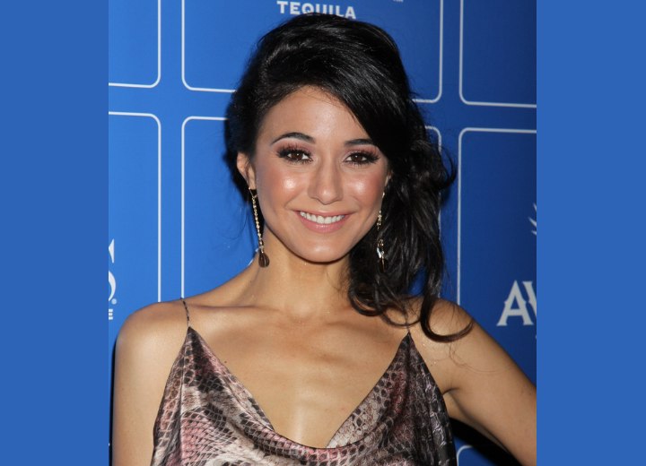 Emmanuelle Chriqui wearing her hair brushed to the side