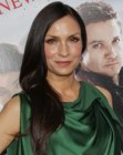 Famke Janssen wearing her hair long and styled to one side