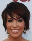 Farah Fath's short haircut with bangs and slithered ends