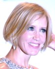 Felicity Huffman wearing her hair short in an above chin length bob