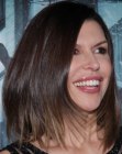 Finola Hughes sporting a medium length layered hairstyle that frames her face