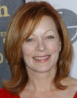 Frances Fisher wearing her hair with ends that rest upon her shoulders