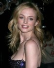 Heather Graham wearing long shag-type hair with layers