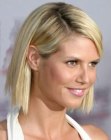 Heidi Klum with her hair cut into a razor cut bob