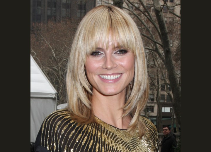 Heidi Klum with her hair cut just over the shoulders