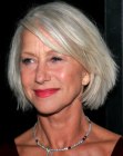 Helen Mirren with her silver grey hair cut in a neck-length bob