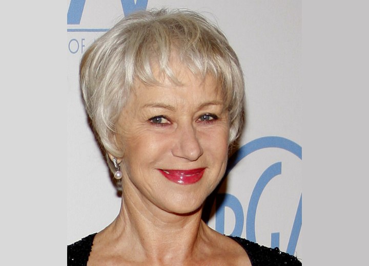 Helen Mirren wearing her silver white hair short in a pixie