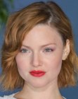 Holliday Grainger wearing her hair in a bob with wavy styling