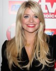 Holly Willoughby's trendy long hairstyle with an off center parting