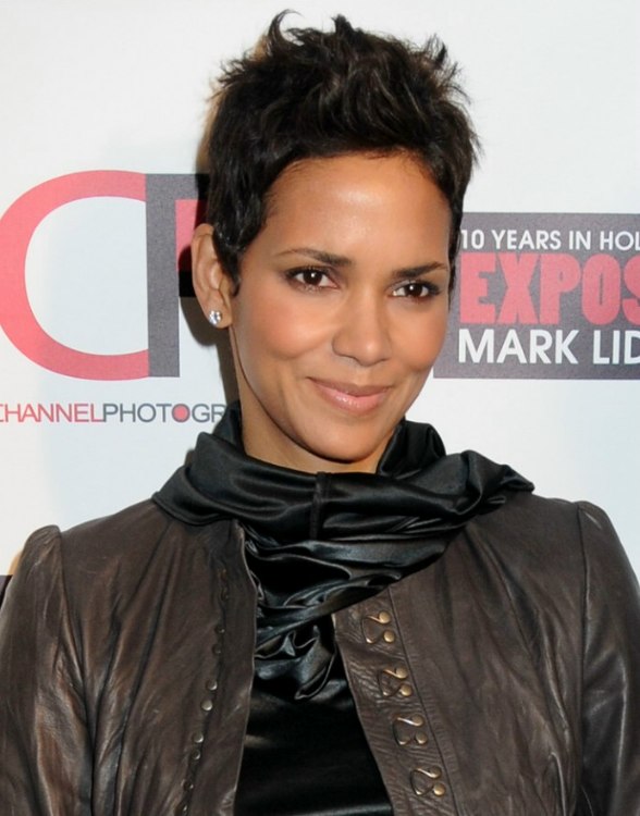 Halle Berry with her hair cut around the ears in a pixie