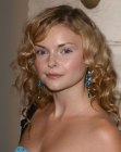 Izabella Miko sporting long curls that caress her shoulders