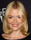 Jaime King's medium length hairstyle with long side bangs