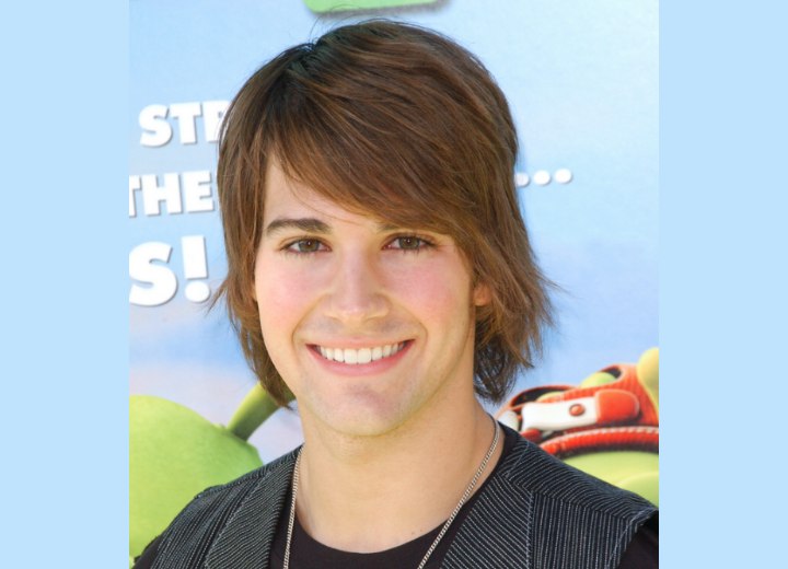 James Maslow with his hair in a shag that covers his neck