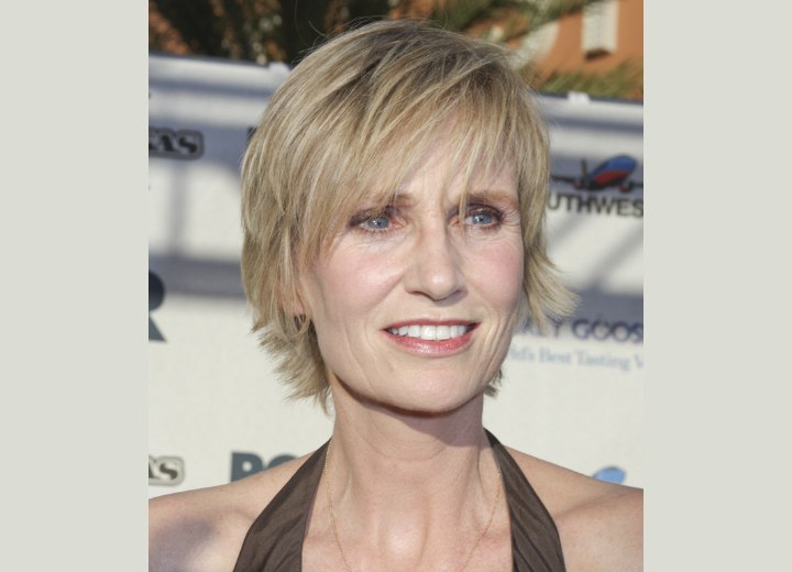 Jane Lynch sporting an easy short hairstyle