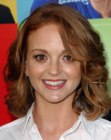 Jayma Mays wearing her reddish hair in a medium long style with layers