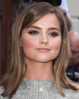 Jenna Coleman's versatile medium length hair styled with an outward flip