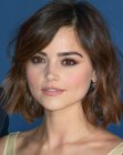 Jenna Coleman wearing a medium length bob with side bangs