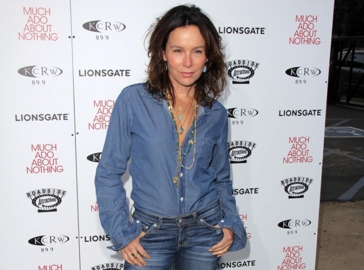 Jennifer Grey wearing a youthful denim shirt