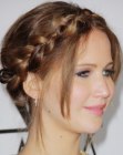 Jennifer Lawrence wearing a braided up-style