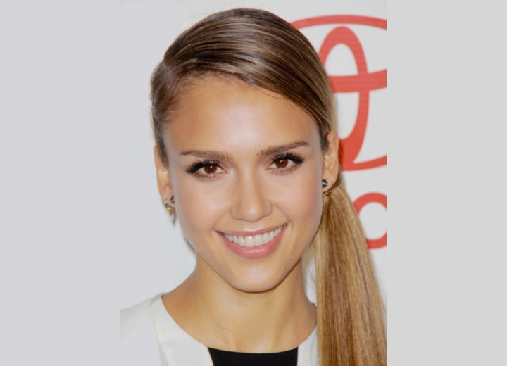 Jessica Alba wearing her hair in a side ponytail
