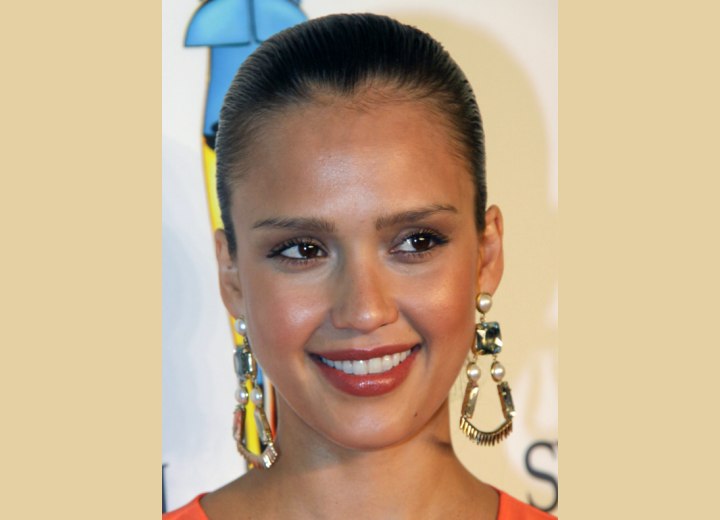 Jessica Alba with her hair styled to the back