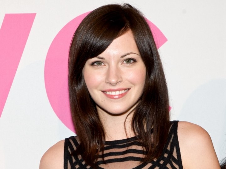 Jill Flint with slick and shiny mahogany brown hair