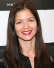Jill Hennessy with her long brown hair styled loose and open