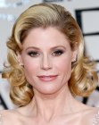Julie Bowen with her hair swept back