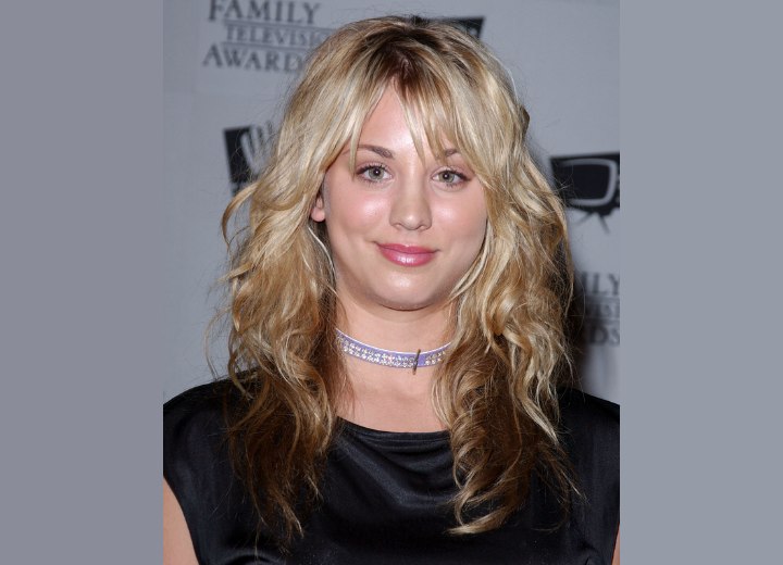 Kaley Cuoco with curls below the shoulders