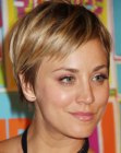 Kaley Cuoco with her hair in a pixie