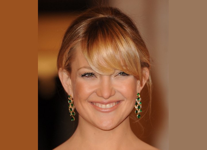 Kate Hudson wearing her hair in a peasant style