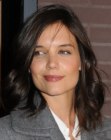 Katie Holmes wearing her dark hair long and cut into layers