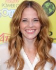 Katie Leclerc with long wavy hair