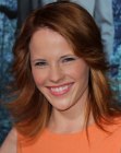 Katie Leclerc with her hair flipped outward