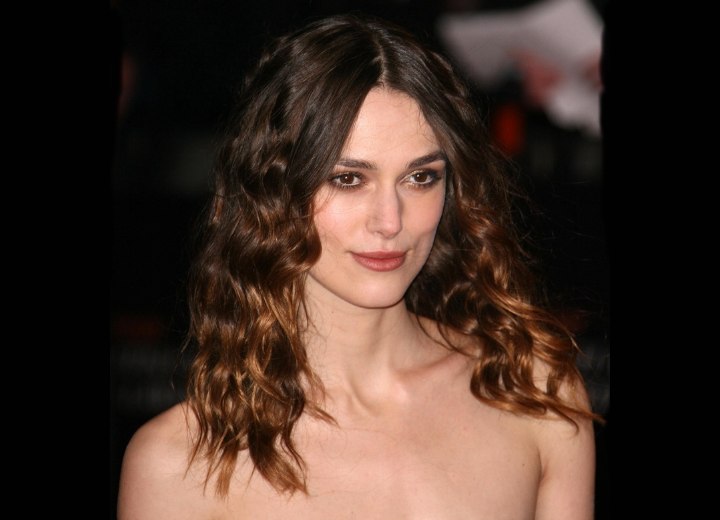 Keira Knightley sporting long hair with waves