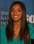 Keke Palmer with her long hair styled for a natural look