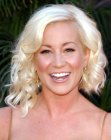 Kellie Pickler's asymmetrical hairstyle with bouncy curls